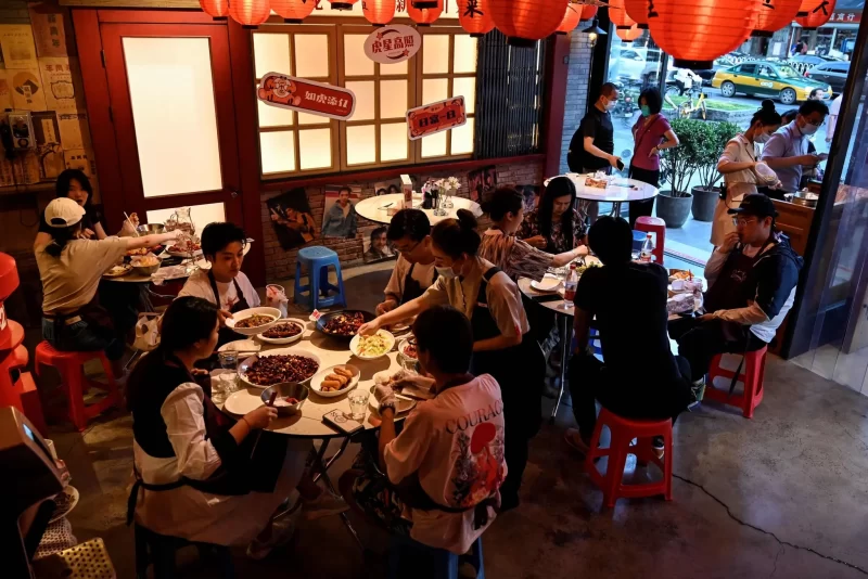 A restaurant in Beijing on Monday after the easing of Covid restrictions, which have damaged China’s economy. Credit: Jade Gao/Agence France-Presse — Getty Images