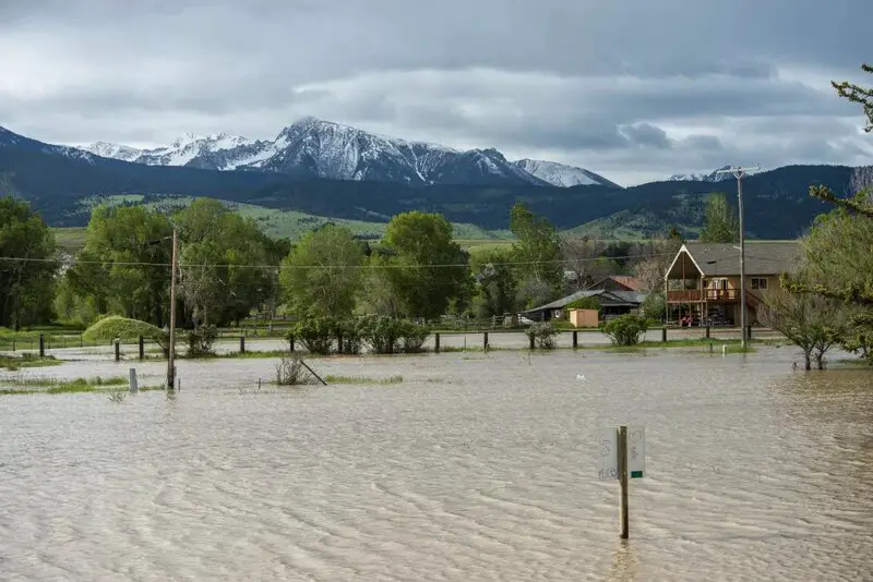 Flooding is observed in Livingston, Montana on June 14, 2022. Rain and snow melt from the mountains in and around Yellowstone National Park have resulted in a historic high flow of the Yellowstone River.